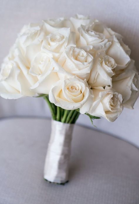 You can never go wrong with white roses. The perfect, simple wedding bouquet. Planned by Best Bride. Instagram- @bestbride_ #bouquet #weddingbouquet #flowers #weddingphotos #wedding #bestbride #bestbrideLA #weddingplanner Plain White Bouquet, All White Wedding Bouquet Roses, Just White Roses Bouquet, Simple White Bride Bouquet, Simple Rose Wedding Bouquet, Only Roses Bouquet, Diy White Rose Bouquet, Ivory Rose Wedding Bouquet, Bride Bouquets White Roses