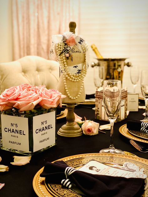 An Afternoon with Coco Chanel – S I P [Social Interactions and Parties] Chanel Table Setting, Chanel Birthday Party Ideas Classy, How To Decorate Round Tables For Party, Chanel No 50 Party, Coco Chanel Theme Birthday Party, Chanel Themed Party, Chanel Party Theme Decoration, Coco Chanel Party Decorations, Chanel Theme Party