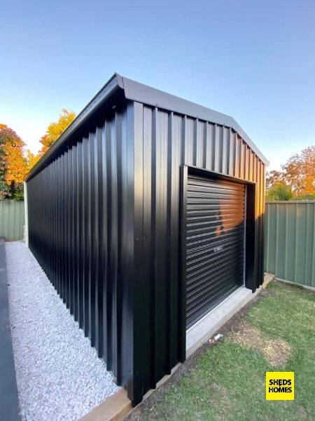 It is said that beauty is in the eye of the beholder. And every beholder says this shed is a beauty 🕺

Colleen was keen to clean up the backyard and couldn’t wait to fill the shed once it was built with all her gardening tools and pool equipment 💦 Backyard Workshop Buildings, Garage Hot Tub, Modern Sheds, Contemporary Sheds, Outside Storage Shed, Shed Workshop, Metal Building House Plans, Standing Seam Roof, Tin Shed