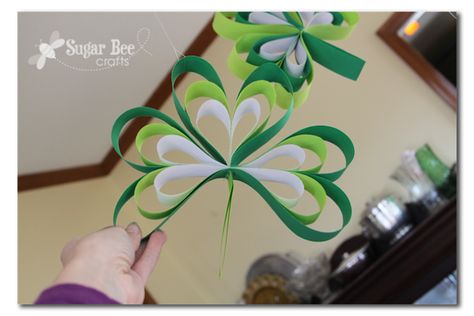 Easy DIY Paper Strip Shamrocks for St. Patrick's Day March Window Display Ideas, Librarian Ideas, Shamrock Craft, Somebunny Loves You, St Pats, St Patrick's Day Crafts, St. Patricks Day, Store Window, Bee Crafts