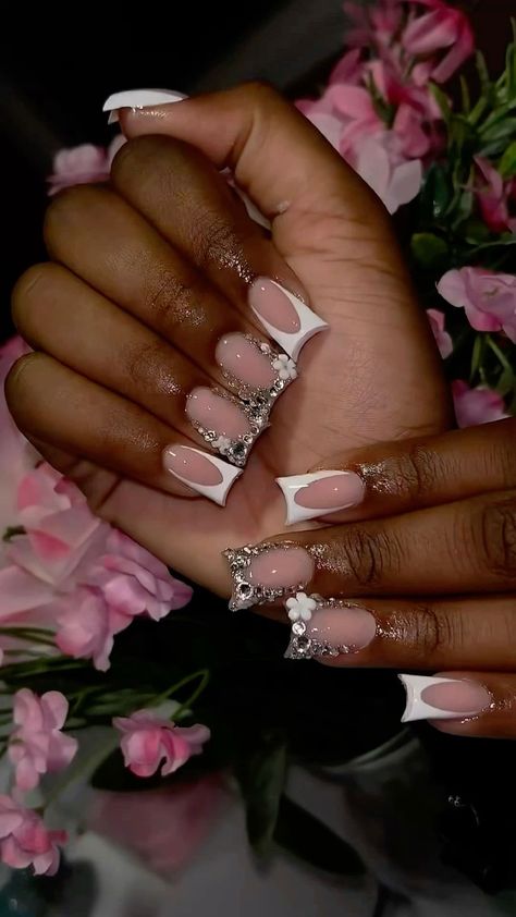 There's a new beauty trend taking over Instagram and it's absolutely stunning. Say hello to "quartz nails". Frenchie Nails With Rhinestones, Short White Nails With Charms, White French Tip Duck Nails, Junk French Tip Nails, Birthday Junk Nails, White French Tip Nails With Charms, Short Heels For Prom, French Nails With Charms, Flower Charm Nails