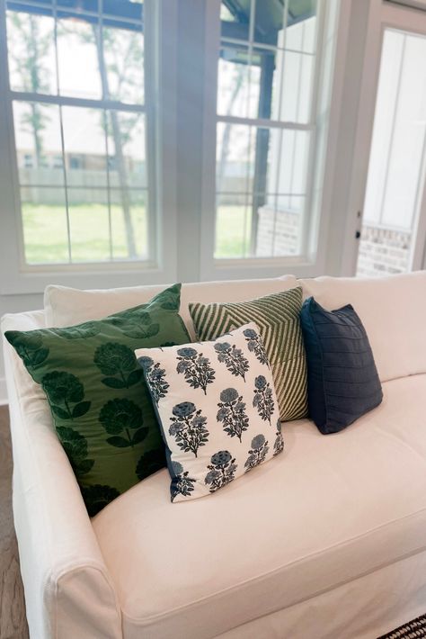 Blue Green Black White Living Room, White Couch Green Pillows, Blue And Green Pillows On Couch, Blue And Green Throw Pillows, Green Living Room Color Scheme, Cream Couch, Original Farmhouse, Blue And Green Living Room, White Leather Sofas