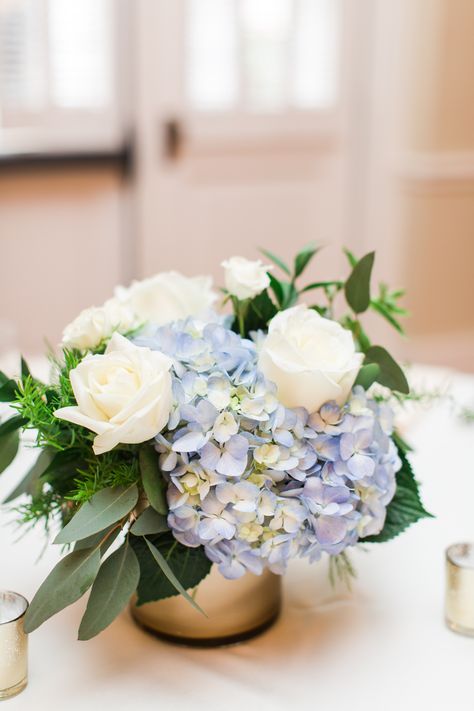 Hydrangeas And Roses Centerpiece, Eucalyptus And Hydrangea Centerpieces, Hydrangea And Roses Arrangements, Blue Green Centerpieces, Blue Floral Centerpieces Simple, Blue And White Flowers Centerpieces, Wedding Table Centerpieces Hydrangea, Hydrangea And Greenery Centerpiece, Blue And White Wedding Flowers Centerpieces