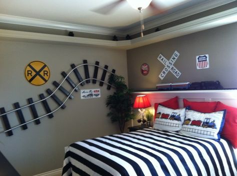 Trains! Train themed kids rooms that will makes any kids dreams come true! Featured on Designdazzle.com Transportation Bedroom, Train Bedroom, Railroad Crossing Signs, Theme Bedrooms, Transportation Vehicles, Train Decor, Railroad Crossing, Theme Bedroom, Train Room