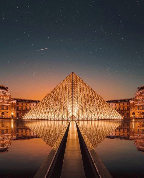 This is a picture of the Louvre Museum, located in the city of Paris, the capital of France 🇫🇷⁣ ⁣ Fun Facts: The Louvre, or the Louvre Museum, is the world's largest art museum and a historic monument in Paris, France. A central landmark of the city, it is located on the Right Bank of the Seine in the city's 1st arrondissement. It is so big that it is humanely impossible to see all the museum has to offer in one visit. How long would it take you? Well, if you ever have 100 days spare, you coul Musee Du Louvre, Louvre Paris, The Louvre, Starry Sky, Pyramid, Paris France, Louvre, Paris, France