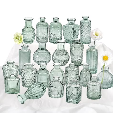 PRICES MAY VARY. 🌷【Different Vintage Look, Green Rustic Design】🌷 Contains 22 bud vases of different shapes, this set of glass vases for centerpieces is the design of relief on the glass surface, which is exquisite, beautiful and unique. The different designs & heights & shapes make the collection interesting to look at even without flowers. 🌷【High Quality Small Glass Vase】🌷 Our 22pcs small glass vase set is made of high-quality glass. Our glass is much thicker then others, small bud vase is Small Vases With Flowers Glass, Green Glass Bottles With Flowers, Glass Vases Centerpieces With Pictures Inside Vase, Sage Green Wedding Theme Centerpieces Table Numbers, Sea Glass Green Flowers, Vases On Wedding Tables, Centerpieces Small Vase, Rustic Wedding Table Vases, Eucalyptus Bouquet Vase Mason Jars