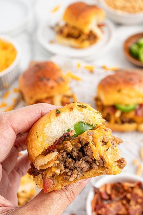 hand holding a Cowboy Slider. Cowboy Sliders Recipe, Cajun Sliders, Cowboy Sliders, Cowboy Burgers, Cowboy Recipes, Ground Beef Sliders, Cowboy Burger, Hamburger Sliders, Bbq Sliders