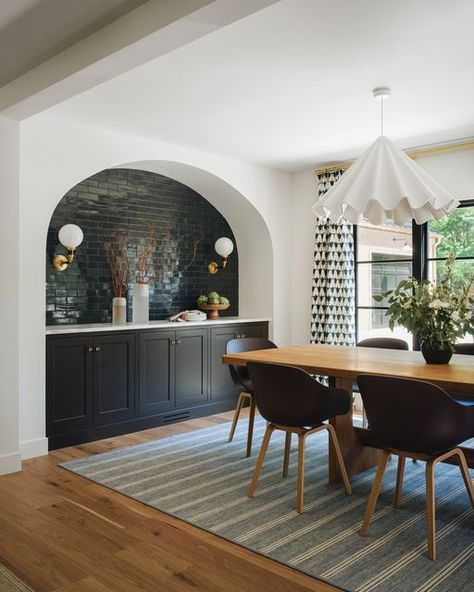 Stoffer Home Cabinetry on Instagram: "Soft edges paired with deep contrast makes for another beautiful built-in from the Dogwood project, playfully nestled within an arched niche.  Finish: Brighton Bronze Lighting: @stofferhome  Design: @jeanstofferdesign" Arched Wall Dining Room, Built Ins In Dining Room, Arched Niche, Built Ins Dining Room, Jean Stoffer Design, Dining Room Built Ins, Stoffer Home, Jean Stoffer, Dining Room Built In