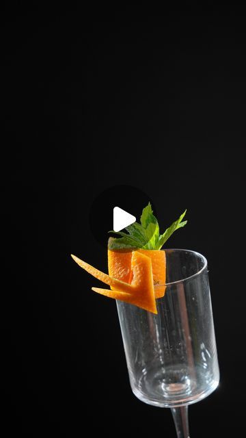 𝗖𝗿𝗶𝘀𝘁𝗶𝗮𝗻 𝗣𝗮𝘀𝘀𝗮𝗿𝗲𝗹𝗹𝗶 𝑩𝒂𝒓𝒕𝒆𝒏𝒅𝒆𝒓 on Instagram: "💡🍊 Garnish Idea With Orange Peel & Mint

#mixology #summercocktails #garnish #cocktailgarnish #icecream #garnishtutorial #mixologytutorial #garnishidea #fruitgarnish #orangegarnish #garnishgame #garnishingskills" Orange Peel Garnish, Fruit Garnish, Cocktail Garnish, June 17, Orange Peel, Summer Cocktails, Mixology, Ice Cream, Mint