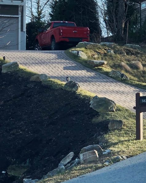 Steep driveway? Pavers give you traction and look good going it! We make sure they're installed correctly, look good,... Uphill Driveway Landscaping, Steep Hill Driveway Ideas, Driveway On A Hill, Steep Driveway Ideas, Steep Driveway, Driveway Pavers, Driveway Ideas, Sloped Yard, Driveway Design