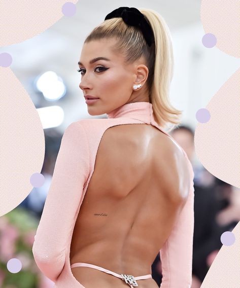 Hailey Bieber Has More Than 19 Tattoos — But You've Probably Never Noticed #refinery29 https://www.refinery29.com/en-us/2019/08/241644/hailey-bieber-tattoos Tiny Tattoos With Meaning, Small Rib Tattoos, Grace Tattoos, Small Back Tattoos, Small Neck Tattoos, Peace Tattoos, Side Neck Tattoo, Rib Tattoos For Women, Basic Tattoos