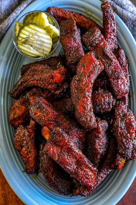 These Cajun ribs feature tender baby back ribs coated in a bold blackened Cajun seasoning, delivering a smoky, spicy kick. Finished with a rich honey butter glaze, they balance the heat with a touch of sweetness for an irresistible flavor. Honey Glazed Ribs, Cajun Ribs, Spicy Ribs, Honey Butter Glaze, Glazed Ribs, Bbq Dry Rub, Butter Glaze, Back Ribs, Ribs Recipe