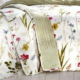 A hand painted delicate floral meadow with a fresh mix of bright spring colours, printed onto crisp easy care, polycotton white fabric. This vibrant bedding will bring colourful warmth to your bedroom and is fully reversible with contrasting vertical green stripe. Vibrant Bedding, Floral Meadow, Floral Bedspread, Floral Bedroom, Spring Colours, Made To Measure Blinds, Vintage Floral Design, Bedroom Furnishings, Floral Duvet Cover