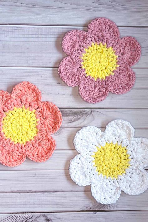 Crochet Flower Coaster Pattern with 6 Petals - thecaffeinatedsnail.com Crochet Flower Coaster Patterns, Crochet Flower Trivet, Crochet 6 Petal Flower, Crochet Daisy Coasters Free Pattern, Coaster Set Crochet Free Pattern, Kitchen Scrubby Crochet Pattern, Crochet 5 Petal Flower Pattern Free, Floral Coaster Crochet, Free Pattern Crochet Coasters