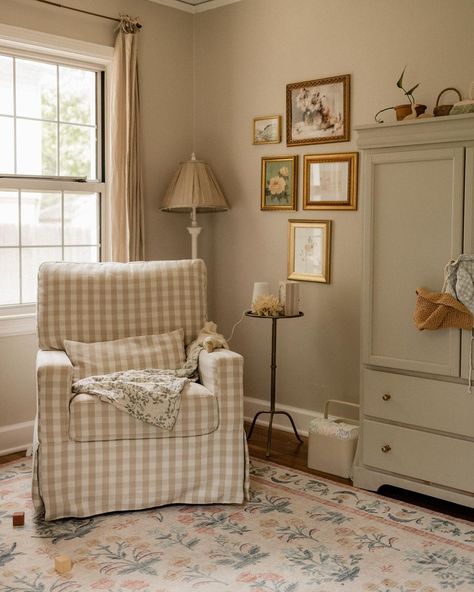 Enter @ourkinandhome’s inviting nursery nook, complete with the Crawford Glider in Tan Gingham. From the floral gallery wall to the antique-inspired furniture, it’s the perfect sweet and cozy corner. 🪟 Gingham Nursery, Cottage Nursery, Closet Art, A Peaceful Place, I Want Her, Baby Room Inspiration, Peaceful Place, Nursery Room Inspiration, Nursery Chair