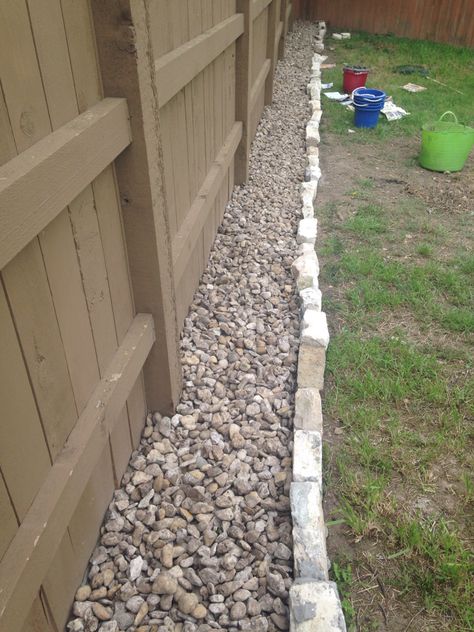 Fence Line  Rock garden Rock Garden Along Fence, Rocks Around Fence Line, Rocks Along Fence, Rock Along Fence Line, Fence Rock Border, Rock Boarder Along Fence, Rock Edge Flower Bed Garden Borders, River Rock Along Fence Line, Rock Filled Fence