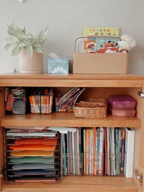 Homeschool Materials Organization, Art Cabinet Organization Storage Ideas, Kids Art Organization Storage, Minimalist School Room, Arts And Craft Storage Ideas, Homeschool Book Storage, Montessori Art Supply Storage, Homeschool Storage Cabinet, Homeschool Storage Ideas Small Spaces