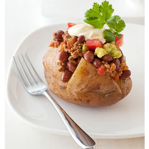 Mexican jacket potato Jacket Potatoes Fillings, Vegetarian Jacket Potato Fillings, Mexican Jacket Potato, Vegan Jacket Potato, Mexican Style Baked Potato, Jacket Potato Recipe, Potato Bar, Jacket Potato, Loaded Baked Potatoes