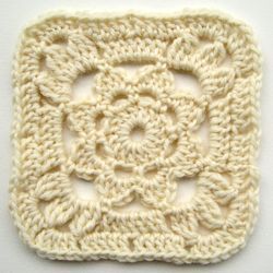 Crochet Spot » Blog Archive » Crochet Pattern: Granny Square With a Flower - Crochet Patterns, Tutorials and News Crochet Pattern Granny Square, Crochet Flower Granny Square Pattern, Pattern Granny Square, Beginning Crochet, Crochet Flower Squares, Baby Afghan Crochet Patterns, Crochet Coasters Free Pattern, Granny Square Crochet Patterns Free, Crochet Blanket Designs