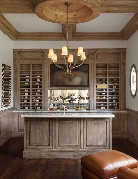 Amazing built in bar boast distressed cabinets under a flatscreen TV niche flanked by built in wine racks. Bar Lounge Room, Distressed Cabinets, Room Bedrooms, Built In Wine Rack, Media Room Design, Home Bar Design, Dining Ideas, Built In Bar, Bar Designs