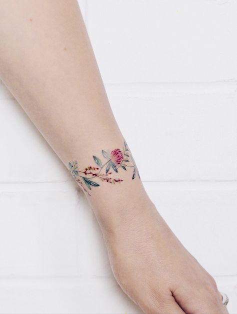 Wildflower Wrist Bracelet Tattoo, Wrist Bracelet Tattoos For Women, Wrist Bracelet Tattoos, Bracelet Tattoos For Women, First Time Tattoos, Wrist Band Tattoo, Bracelet Tattoos, Delicate Flower Tattoo, Wrist Bracelet Tattoo