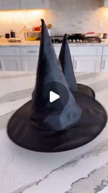 Aleka Shunk on Instagram: "🧙‍♀️So many of you asked about these floating witches hats from a previous reel. Here is how I strung and hung these fun witches hats! It took me under an hour to do it all. You just need a few things! . 🧙‍♀️Witches hats 🧙‍♀️Invisible string  🧙‍♀️Strong tape 🧙‍♀️Mini Command Strips 🧙‍♀️Ladder . The hats are from Amazon! There’s a link in my bio or you can COMMENT HATS for the link!!  . #witcheshats #halloweendecor #halloweendecorations @amazoninfluencerprogram @command #amazonhalloween #halloweeneveryday" Floating Witches Hat, Floating Which Hats, Floating Hats Halloween, How To Hang Witches Hats On Porch, Floating Witch Hats And Candles, Hanging Witch Hats Indoor, How To Hang Witches Hats From Ceiling, Floating Witch Hats Porch, Hanging Witch Hats Porch