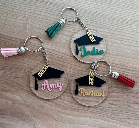 Personalised Graduation Keyring Gift, Personalised Graduation Keychain for graduate with 2023 year of graduation charm. You can choose your colour vinyl for the name. The graduation keyring is clear acrylic and 5cm diameter. Choose your tassel colour. Perfect personalised gift for a graduate. Thank you for your interest. Download Free keychain svg selection for high quality graphics! All of our free svg designs are compatible with both the Cricut and Silhouette machines. Graduation Acrylic Keychain Ideas, Vinyl Keyring Ideas, Personalised Graduation Gift, Graduation Keychain Diy, Graduation Suviners, Graduation Keychain Acrylic, Graduation Resin Ideas, Resin Graduation Gift, Clear Acrylic Keychain Ideas