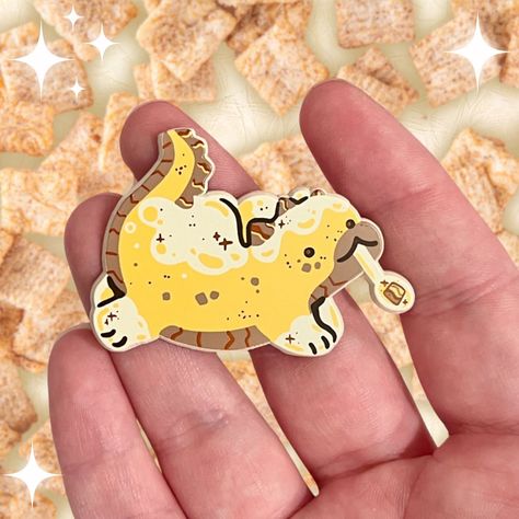 Soft dyed enamel pins my beloved !!!!! Here’s my cinnamon cereal dragon, part of a balanced breakfast 😤🤍✨ — #smallbusiness #merchartist #kidcore #cuteart #stickershop #shopsmall #00skid #90skid #nostalgia #stickercollector #giftideas #happymail #healingmyinnerchild #digitalart #sillyart #dragon #enamelpin #pincollector #breakfast Enamel Pins Aesthetic, Cinnamon Cereal, Balanced Breakfast, Ita Bag, Stationary Supplies, Soft Enamel Pins, Special Interest, Aesthetic Stuff, Backing Card