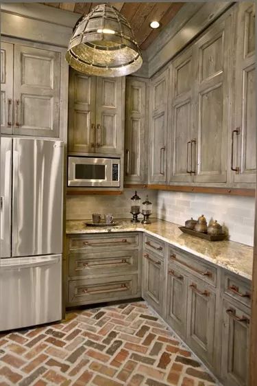 Nutmeg Cabinets Kitchens, Dakota Kitchen, Brick Floor Kitchen, Alder Cabinets, Kitchen Ikea, Rustic Kitchen Cabinets, Kabinet Dapur, Staining Cabinets, Knotty Alder