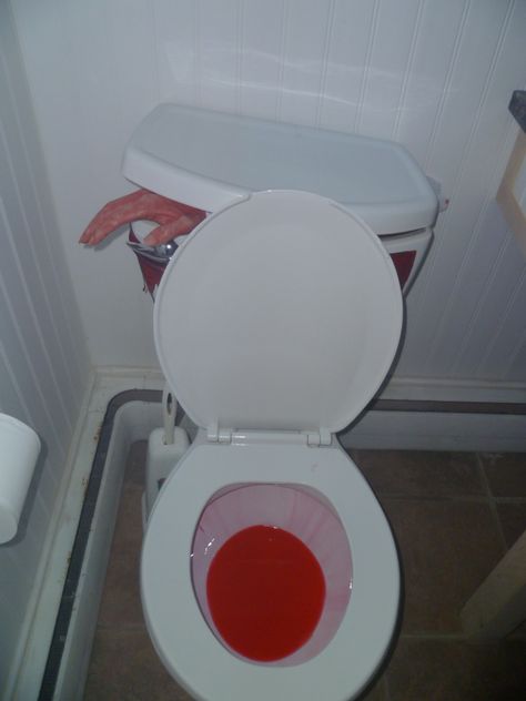 Halloween Bathroom Idea!  Wick a bottle of red pool dye, tip to the side...blood red flush everytime!  Put a red glow stick inside toilet tank, severed hand in tank sticking out!  Awesome! Halloween Bathroom Decorations, Halloween Bathroom Decor, Halloween Decorating Ideas, Cheap Diy Halloween Decorations, Halloween Bathroom, Casa Halloween, Halloween House Party, Modern Halloween, Adornos Halloween