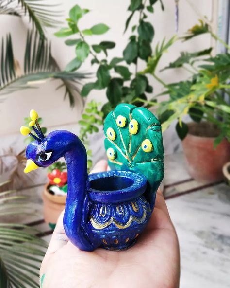 Made using Fevicryl mouldit on an old Diya. Diwali decor idea Fevicryl Mouldit Clay Art Ideas, Tea Pot Clay, Small Flower Making, Kulhad Painting, Fevicryl Mouldit Ideas, Mouldit Art Ideas, Math Exhibition, Matka Decoration, Dokra Art