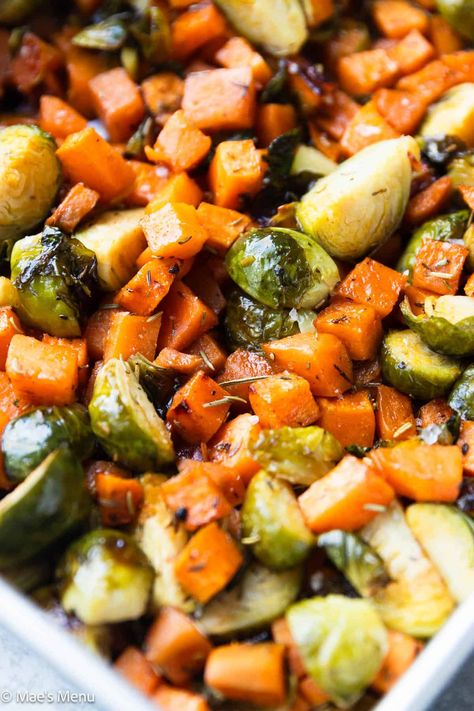 Roasted Brussels Sprouts and Sweet Potatoes - Mae's Menu Brussels And Potatoes, Roasted Sweet Potato Brussel Sprouts, Brussel Sprout Recipes Sweet Potato, Sweet Potatoes Brussel Sprouts Roasted, Roasted Sweet Potatoes And Brussel Sprouts With Bacon, Roasted Brussel Sprouts And Butternut Squash With Balsamic, Brussels Sprouts And Sweet Potato Recipe, Roasted Brussels And Butternut Squash, Brussels And Sweet Potatoes