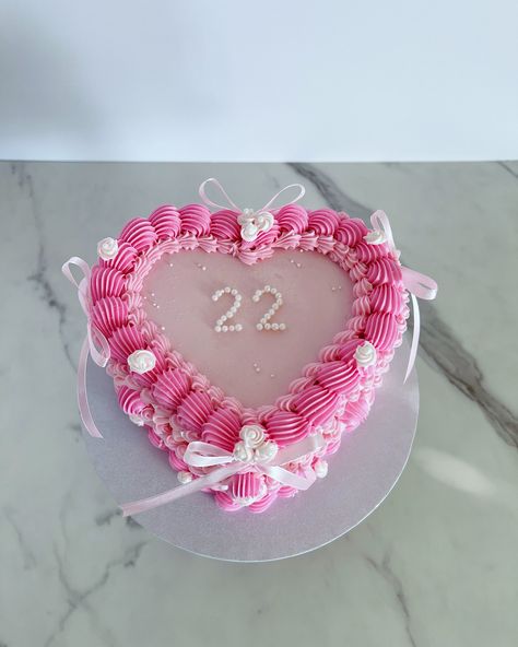 Sweet and delicate heart-shaped birthday cake in pink, celebrating 22 with love!/ Dulce y delicado pastel de cumpleaños en forma de corazón en rosa, ¡celebrando 22 con amor! Custom cakes in Orlando Fl./Tortas personalizadas en Orlando Fl #cakesinorlando #customcakesinorlando #thecitybeautifulcakes #cakeart #orlandofl #heartshapedcakes #heartcake #heartcakesinorlando #tortasdecorazon Heart Shape Cake, Shape Cake, Heart Shaped Cakes, Heart Cake, Pink Vibes, Orlando Fl, Custom Cakes, Heart Shape, Orlando