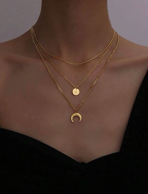 🌙 Three Layers of Elegance:
- The first layer features a delicate crescent moon pendant that symbolizes femininity, intuition, and the ever-changing cycles of life.
- The second layer showcases a dainty disc pendant that can be customized with initials, names, or special dates, making it a meaningful keepsake or a personalized gift for a loved one.
- The third layer boasts a classic cable chain that adds depth and sophistication to the overall design. Celestial Motifs, Roman Letters, Multilayer Necklace, Dating Gifts, Layered Chain Necklace, Sparkly Things, Multi Layer Necklace, Multi Strand Necklace, Modern Elegance