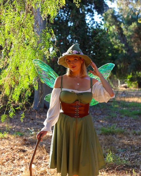 Why choose? Fairy? Witch? I’m both babyyy. 😉🧚🏼🔮✨ This fit is proof that you have fantasy looks in your closet…and that nothing is stopping you from dressing this IRL (except maybe corporate America). shirt & corset belt: @amazonfashion dress: @windsorstore shoes: @anthropologie wings: @ongossamerwings #fantasycore #fantasy #witchaesthetic #fairycore #fairy #fairyaesthetic #fantasyoutfit #halloween What are YOU? Rennaisance Outfits Fairy, Fairy Party Costume, Shirt Corset, Fair Outfit, Fairy Witch, W.i.t.c.h Aesthetic, Fair Outfits, Fairycore Fairy, Ren Fest