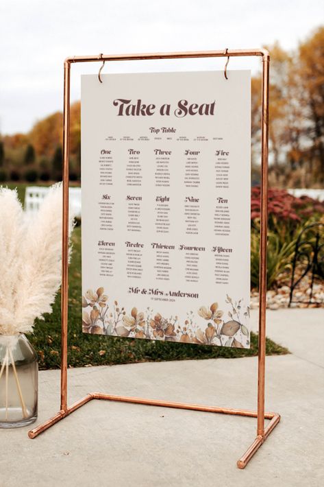 Brown retro/ boho style wildflower print wedding table plan. Shown hanging in a copper frame Hanging Seating Chart, Hanging Seating, Ice Wedding, Find Your Seat, Wildflower Design, Pvc Board, Wedding Table Plan, Seating Plan Wedding, Table Plan