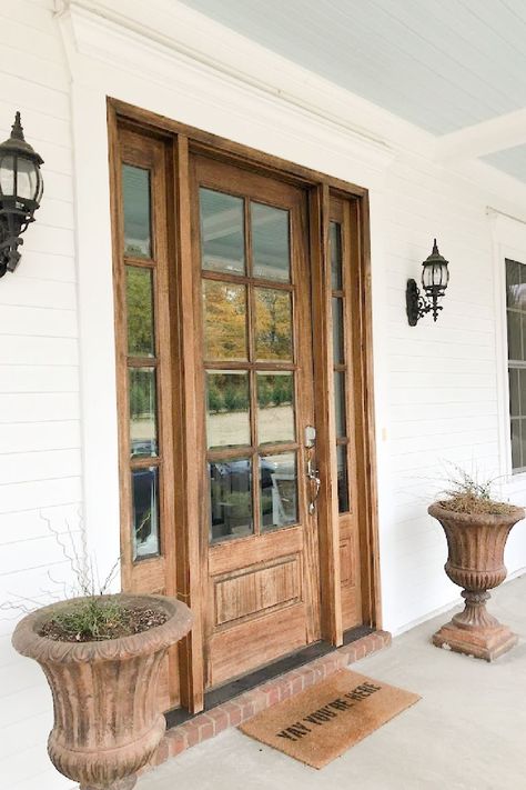 Front door with sidelights at white traditional Southern cottage style home with wide front porch and dormers - Franklin, TN - Hello Lovely Studio. Wood Front Door White Trim, Long Window Next To Front Door, Exterior Doors With Sidelights Farmhouse, Front Door With 2 Sidelights, Front Doors With Windows On The Side, Traditional Front Door With Sidelights, Country Style Front Porch, 3/4 Front Door, Front Door With Sidelights Farmhouse