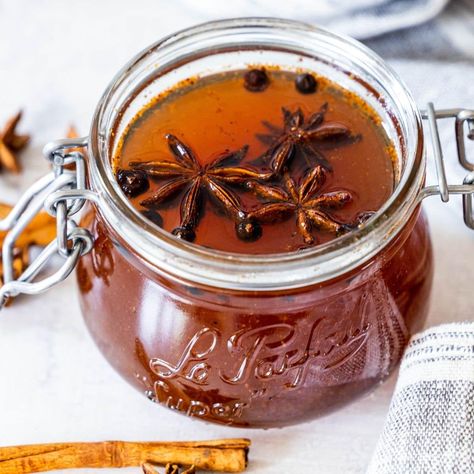 Mulled Simple Syrup Recipe Mulling Spice Simple Syrup Recipe - delicious spiced simple syrup with cinnamon, ginger, nutmeg, cloves, vanilla, juniper, and star anise. Perfect for cocktails, coffee, flavoring desserts, and more! Mulling Spice Simple Syrup Mulling spices are delicious in Mulled Beer, Traditional French Vin Chaud, The Best Mulled Cider Ever, Ginger Mulled White Wine - but also... Read More Read:Mulled Simple Syrup Recipe Clove Simple Syrup, Winter Spice Syrup, Autumn Spice Simple Syrup, Cinnamon Simple Syrup Recipe, Spiced Simple Syrup Recipe, Fall Coffee Syrup Recipe, Simple Syrup Recipe Drinks, Simple Syrup Recipe Cocktails, Clove Syrup