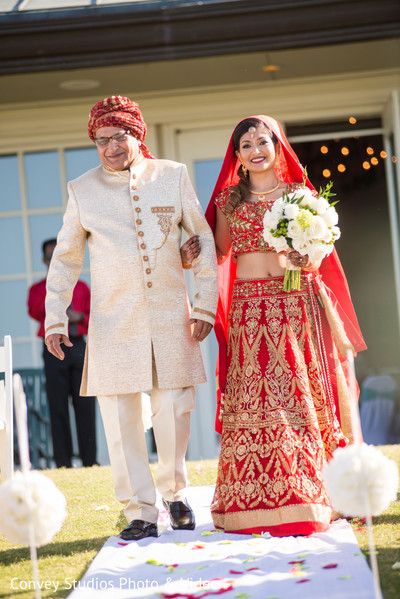 Beautiful bride escorted by her father. http://www.maharaniweddings.com/gallery/photo/119856 Groom Father Indian Wedding Outfits, Bride’s Father Outfit Indian, Wedding Outfit For Father, Sherwani For Father Of The Bride, Bride Entry With Father, Sherwani For Bride's Father, Grooms Father Outfit, Bride Father Outfit, Bride Father Outfit Indian