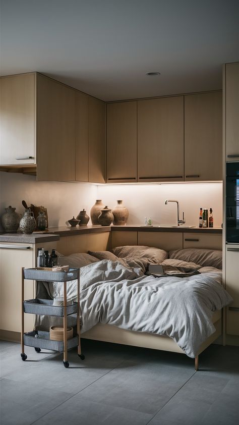 🌿 Ever thought about transforming your kitchen into a serene retreat? 🛏️✨ Imagine stepping into your kitchen and finding a cozy, Zen-inspired nook where you can unwind after a long day. That's exactly what this beautiful IKEA-style setup offers! With a neutral-toned duvet that invites relaxation, this clever integration of a bed into the heart of the home is both functional and calming. Here's why I love this space: 🔹 **Versatility**: This nook serves as a multi-functional area—perfect for... Bed Nook, Calming Atmosphere, Rolling Cart, Under Cabinet Lighting, Under Cabinet, Cabinet Lighting, Ceramic Vases, Easy Storage, Neutral Tones