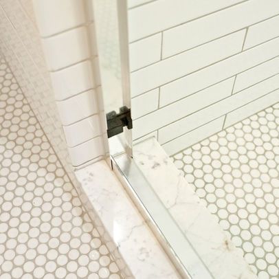 White Penny tile floor/gray grout. White subway tile shower with gray grout Penny Tile Shower Floor, White Penny Tile, Penny Tiles Bathroom, Penny Tile Floors, White Grout, Subway Tile Showers, Fitted Bathroom Furniture, Grey Grout, Penny Round Tiles