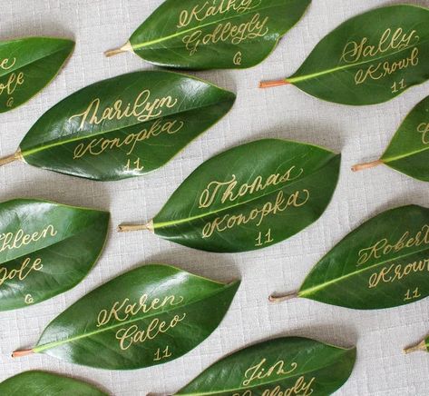 gold calligraphy magnolia leaf for escort card