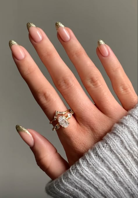 Almond Acrylic Nails New Years, French Gold Glitter Nails, Sparkly Gold French Tip Nails Almond, Sparkly Gold French Tip Nails, Winter Engagement Nails, Almond Nails Gold Tips, Subtle Gold Nails, Gold Nails Sparkly, Golden French Nails Gold Glitter