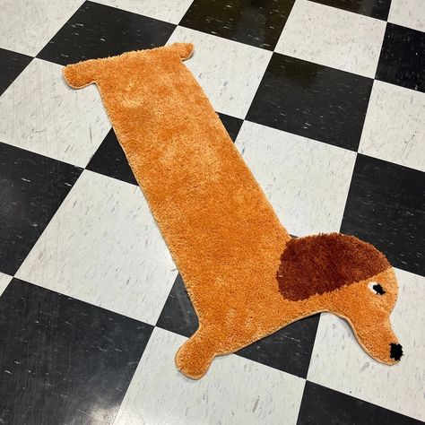 Make your house a home with this very loooooooong pup rug! This rug is so damn cute and is perfect for that little spot in your house that needs a special touch. Whether you use it as a door mat, wall decor, bathroom mat, or pooch place mat, you won’t regret adopting this good buy. I mean boy. Design is a dachshund mix, we haven’t done the DNA test yet. Made from 100% polyester, can be machine washed, but we recommend hand washing. Do not iron, air dry only. Size: Measures 42” x 20” M... Tufting Rugs, Dog Rug, White Elephant Game, Rug Tape, Wall Decor Bathroom, Dachshund Mix, Weenie Dogs, Dna Test, Bathroom Mat