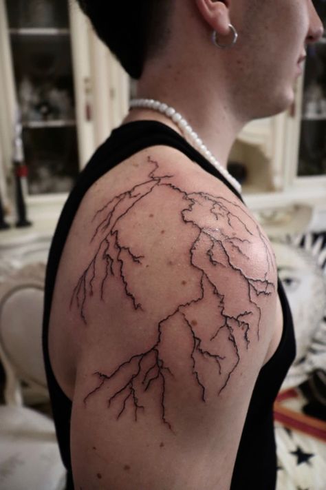 aesthetic lightning tattoo Aesthetic Shoulder Tattoo Men, Thunderstorm Tattoo Sleeve, Red And Black Lightning Tattoo, Lighting Tattoo On Shoulder, Aesthetic Shoulder Tattoo, Lightning Bolt Tattoo Men, Lightning Tattoo Realistic, Ride The Lightning Tattoo, Lighting Tattoo Shoulder