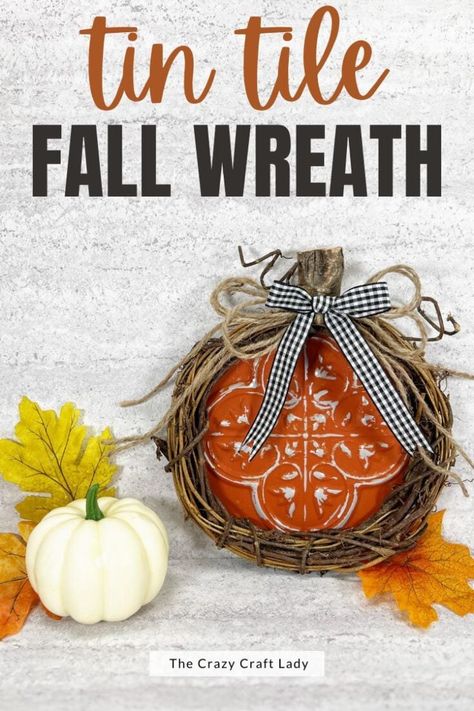 Tin Tile Crafts, Tin Wall Tiles, Mini Grapevine Wreath, Faux Tin Tiles, Pumpkin Craft, Dollar Tree Halloween, Wreath Pumpkin, Fall Grapevine Wreaths, Easy Fall Decor