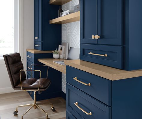 Home Office with Built-In Blue Desk Cabinets - Homecrest Cabinetry Built In Desk With Cabinets And Shelves, Navy Office Cabinets, Dark Blue Office Cabinets, Navy Blue Office Cabinets, Desk Built Into Wall Home Office, Blue Office Cabinets, Home Office Dark Walls, Office Built In Cabinets And Desk, Blue Desks