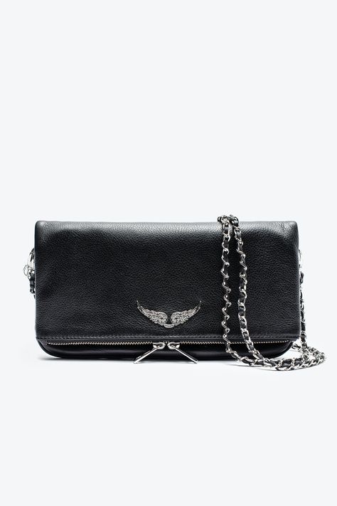 The iconic Rock clutch will take you seamlessly from day to evening. It features a double chain and leather strap, so you can choose to wear it across the body or on the shoulder. - Zadig&Voltaire Women’s Rock clutch in black leather - Worn on the shoulder or across the body - Removable chain - Adjustable and removable shoulder strap - Several compartments including a large, zipped interior compartment - Zipped pocket at the back - Zip closure - Flap with magnetic closure - Removabl Leather Wear, Zadar, Double Chain, Zadig And Voltaire, Womens Purses, Black Bag, Leather Clutch, Metal Chain, Cow Leather