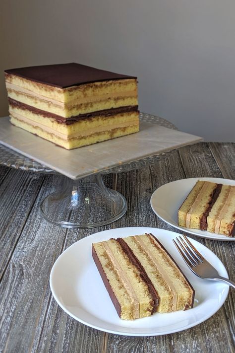 I created this Mini Opera Cake recipe because, let's face it, a full sized dessert is just too dang big.  Layer coffee soaked joconde with coffee buttercream and chocolate ganache for the perfect bite of cake.  This classic French dessert is notoriously complicated, so I've broken it down across several days for you!  #bakesandblunders #foodblogger #foodphotography #cake Cakes For Coffee Shops, Slice Cakes Ideas, Moose Dessert, Opera Cake Recipe, Coffee Frosting, Easy Bakes, Classic French Desserts, Opera Cake, Rectangle Cake