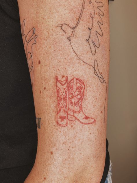 Country Fine Line Tattoo, Red Cowboy Boots Tattoo, Pair Of Boots Tattoo, Big Bend Tattoo, Western Fine Line Tattoo Ideas, Cowboy Boots Tattoos, Red Cowboy Boot Tattoo, Red Ink Fine Line Tattoo, Tennessee Tattoos